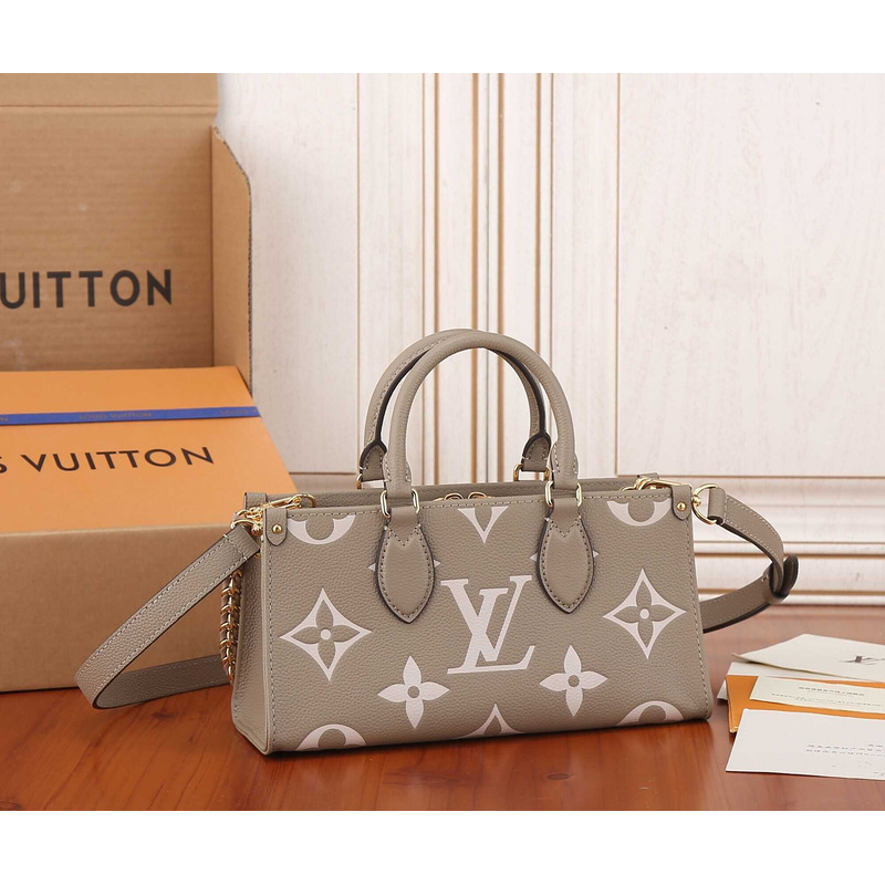 l**is V*t*n onthego east west bicolour monogram empreinte leather dove/cream