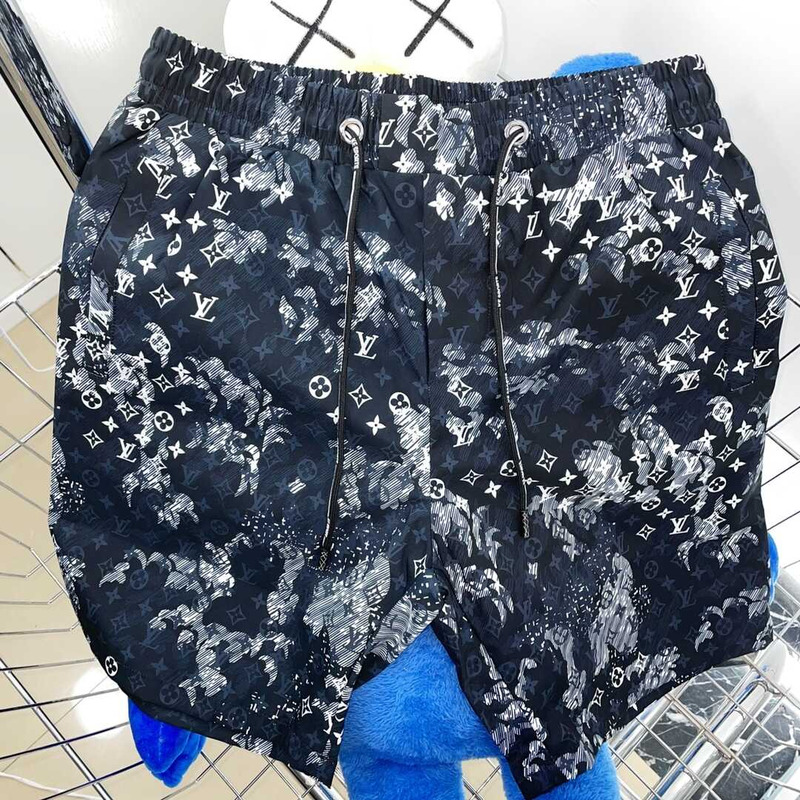 l**is V*t*n monogram shorts dark blue