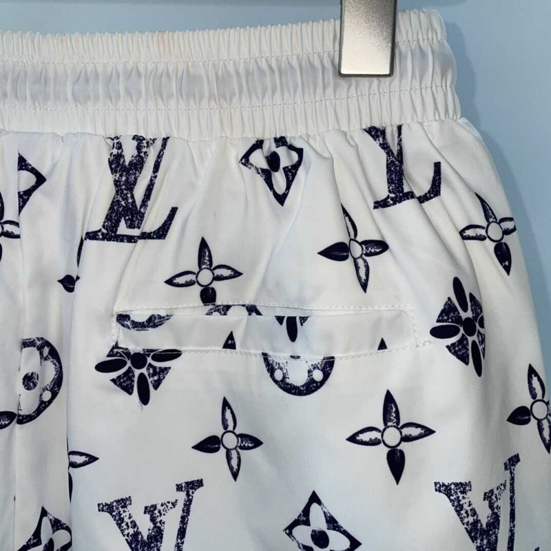 l**is V*t*n monogram shorts blue/white