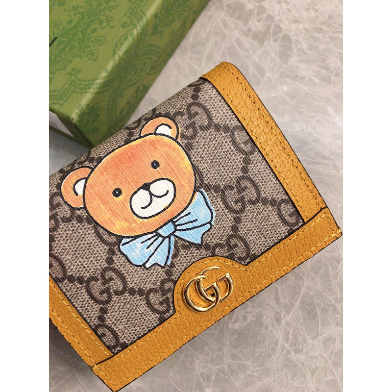 G*u*i teddy bear wallet yellow