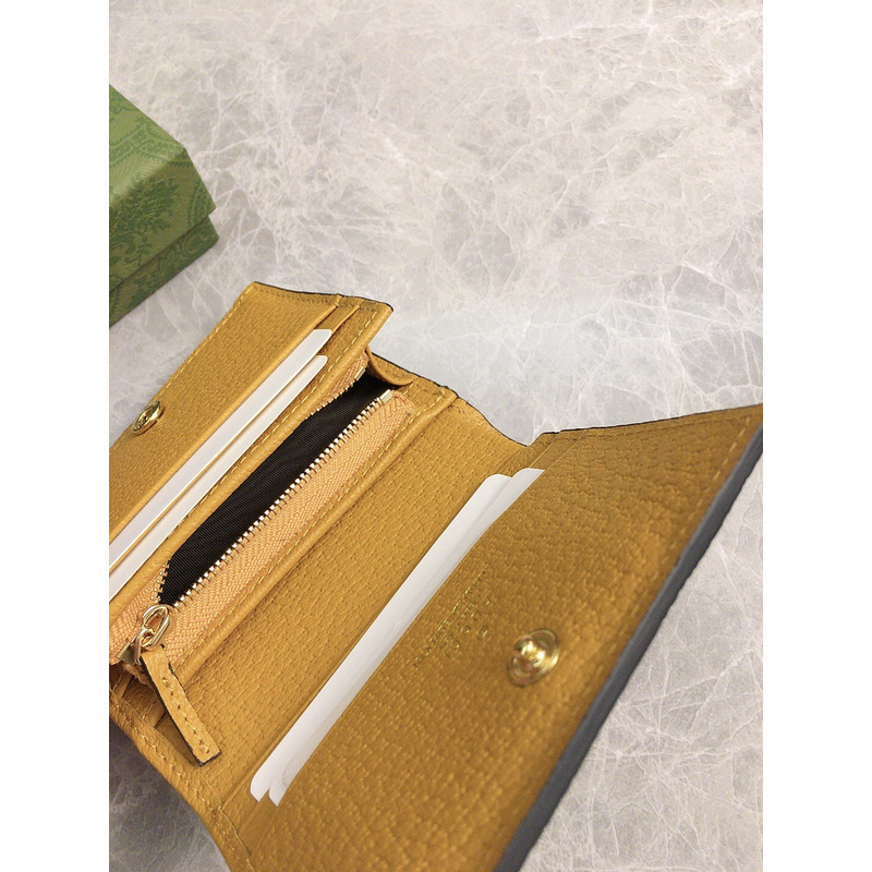 G*u*i teddy bear wallet yellow