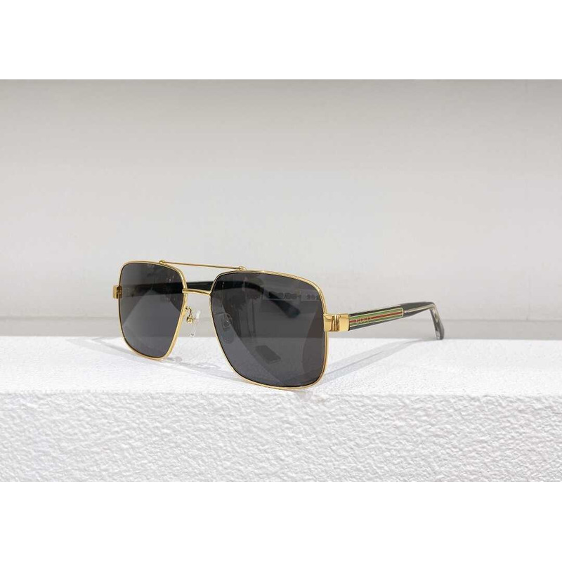 G*u*i sunglasses gold