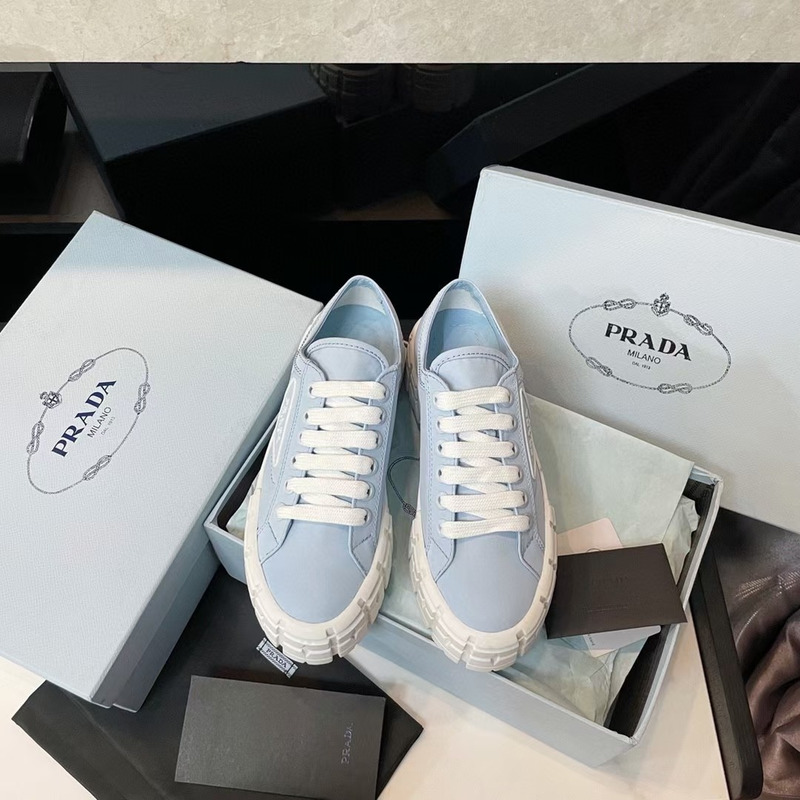 Pra*a women\''s blue and white trainers