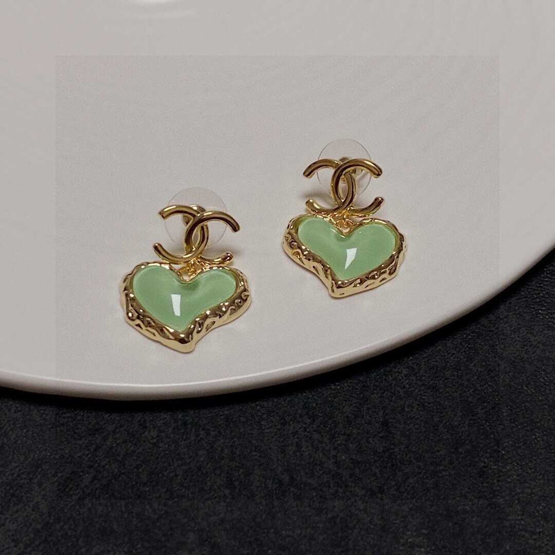 Ch*el love rhinestone earrings gold logo green