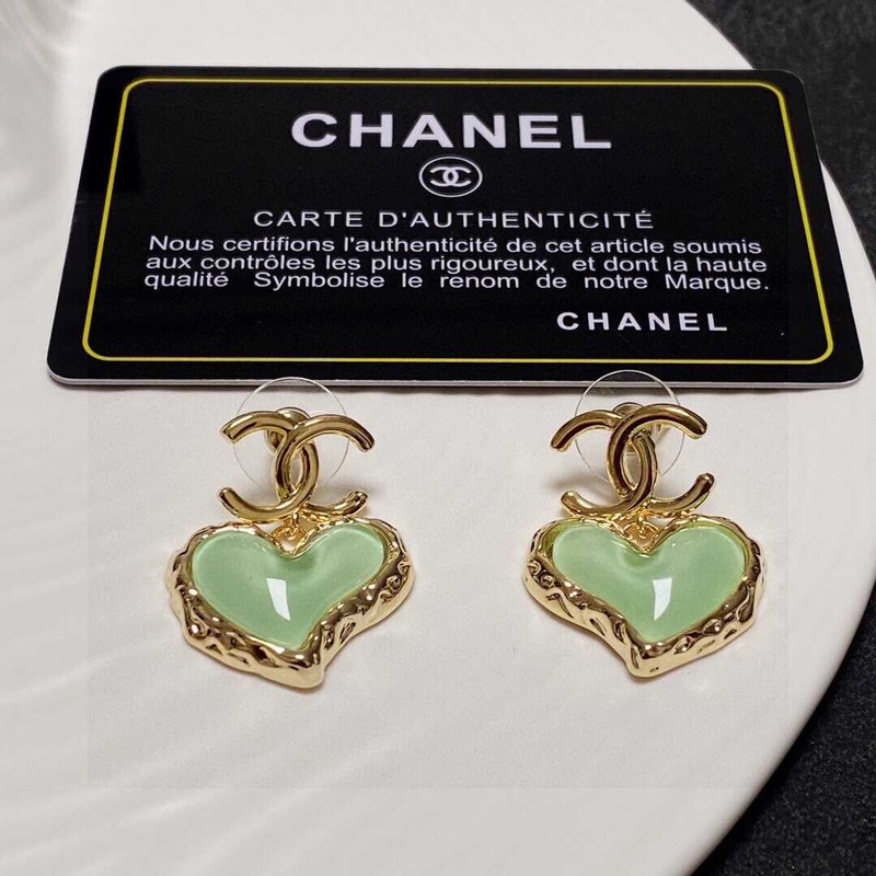 Ch*el love rhinestone earrings gold logo green