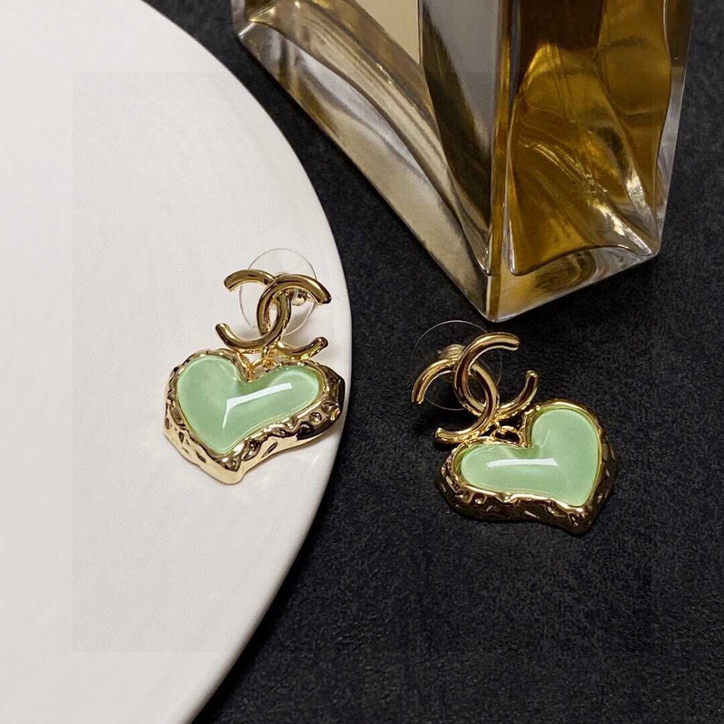 Ch*el love rhinestone earrings gold logo green