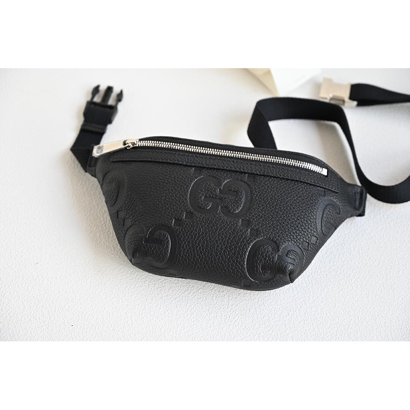 G*u*i gg-embossed belt bag