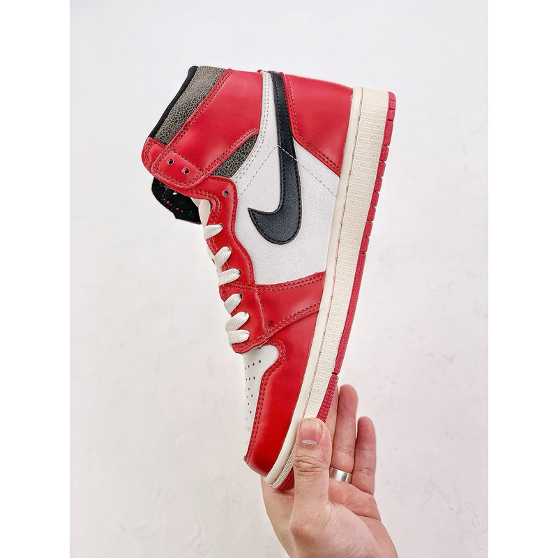 Jordan 1 Retro High OG Chicago Lost and Found Sneaker