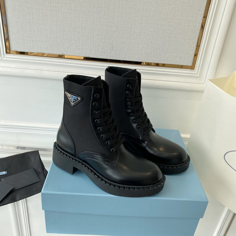 Pra*a brushed-leather and re-nylon boots black