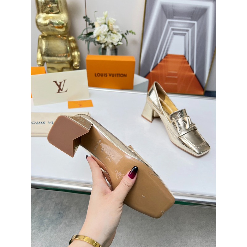 l**is V*t*n upper case block heels gold