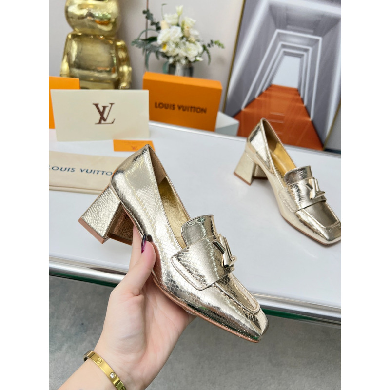 l**is V*t*n upper case block heels gold