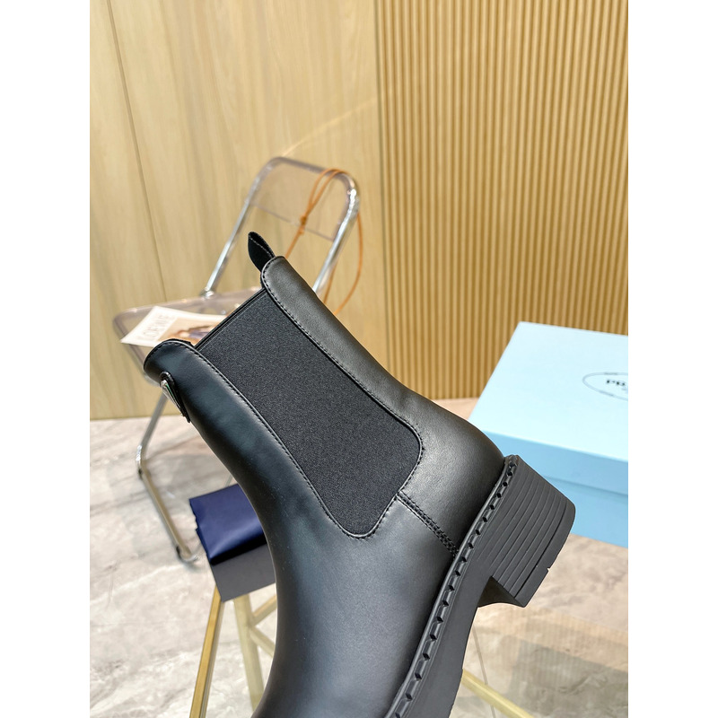 Pra*a leather booties in black