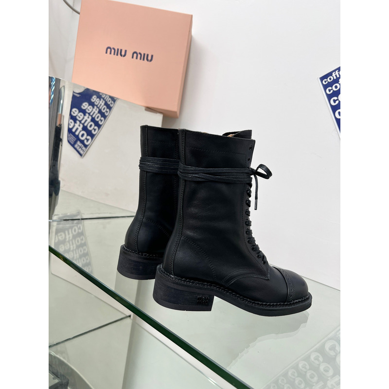 Miu Miu Leather Boots In Black