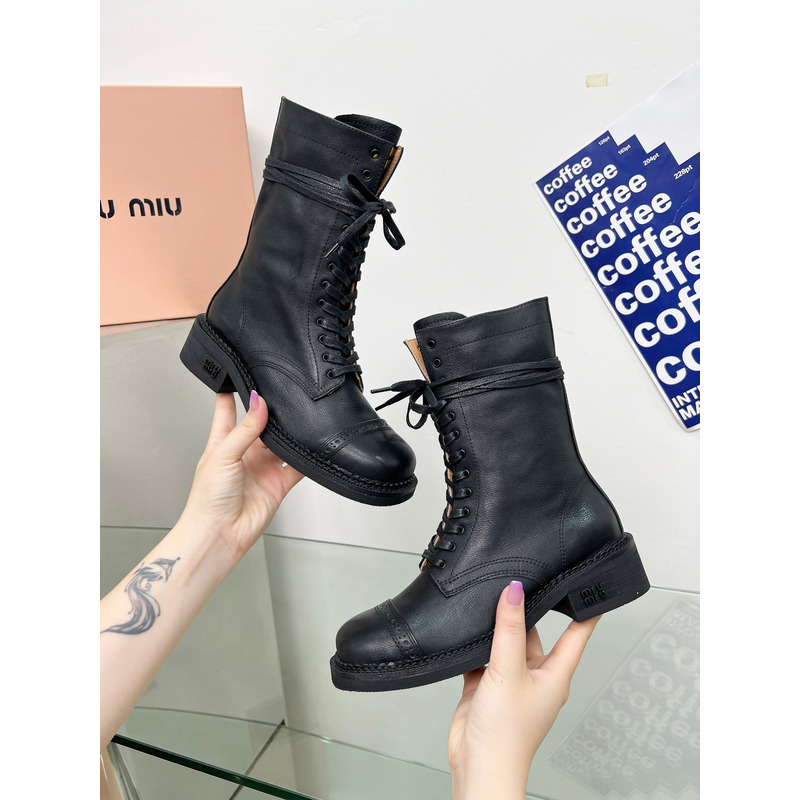 Miu Miu Leather Boots In Black