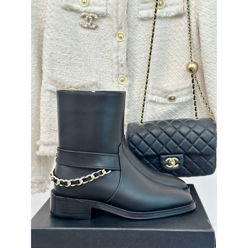 Ch*el cc logo calfskin chain ankle boots in black