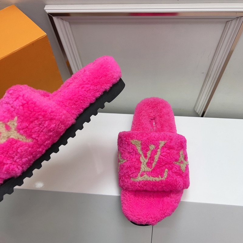 l**is V*t*n paseo flat comfort mules hot pink