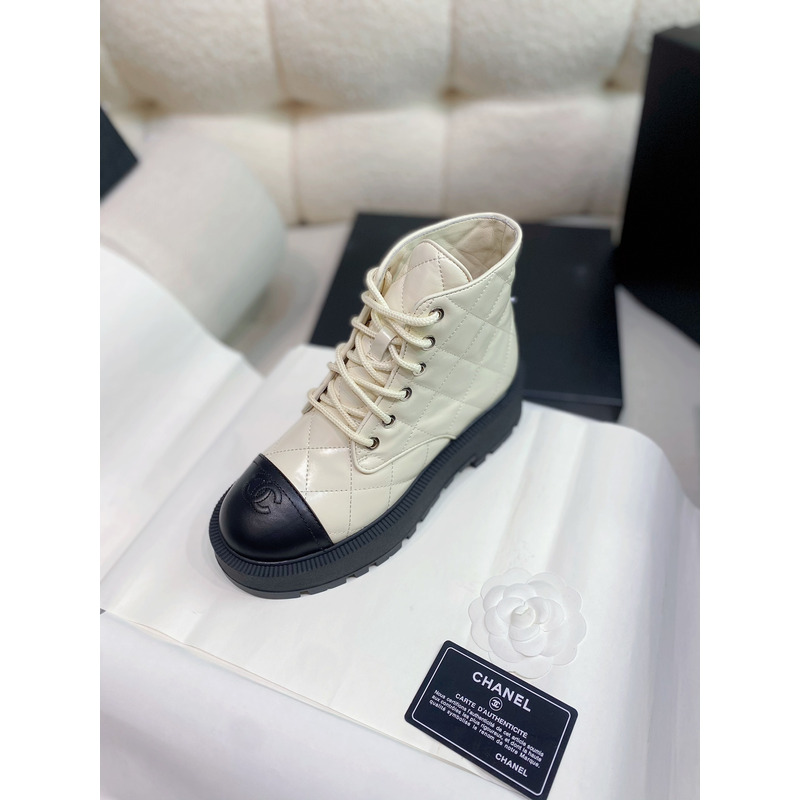 Ch*el quilted calfskin and lambskin boots white&black