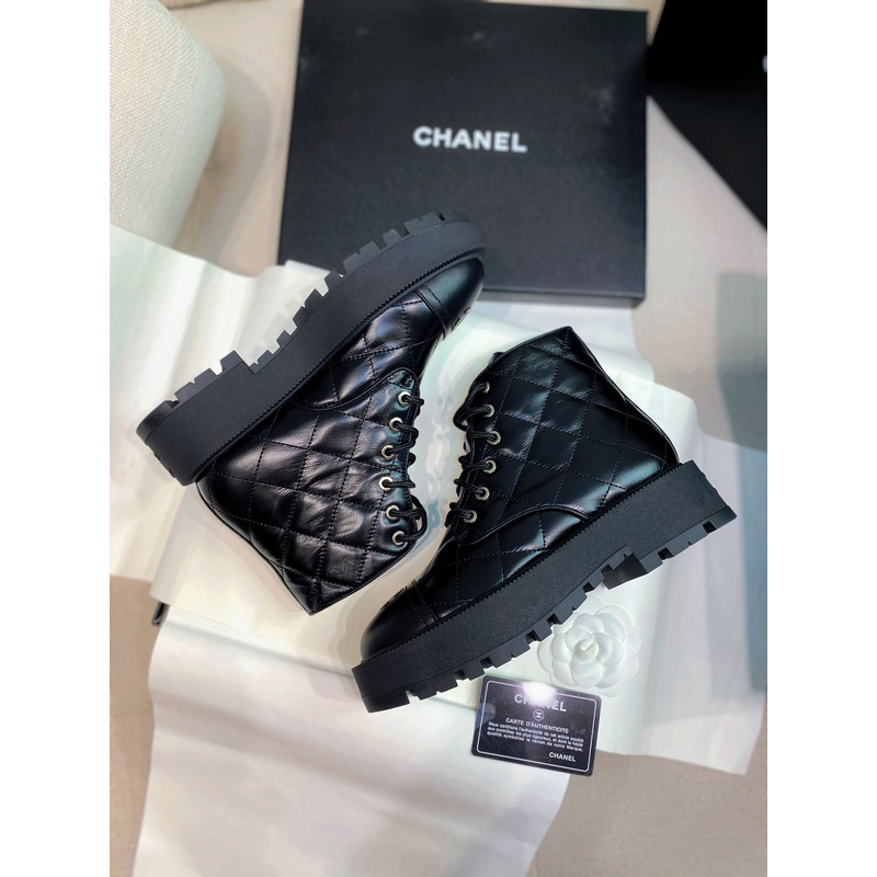 Ch*el quilted calfskin and lambskin boots black