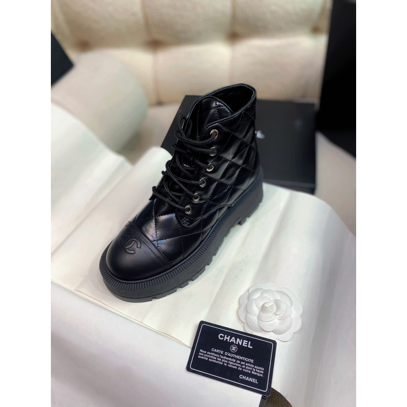 Ch*el quilted calfskin and lambskin boots black