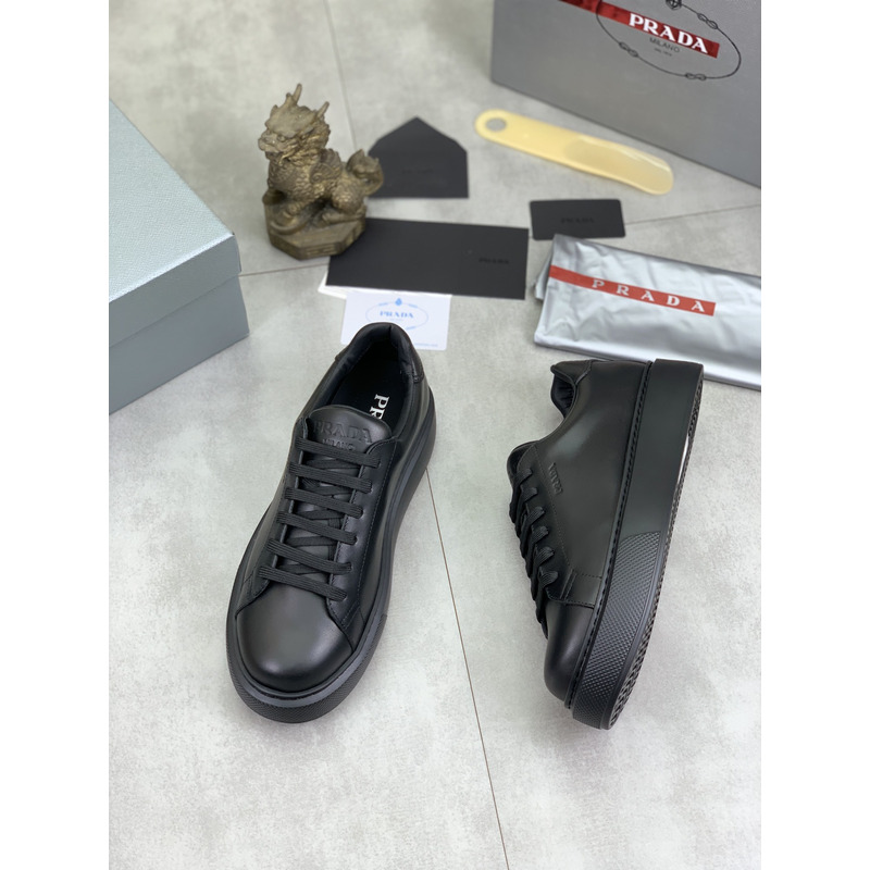 Pra*a logo leather sneaker in black