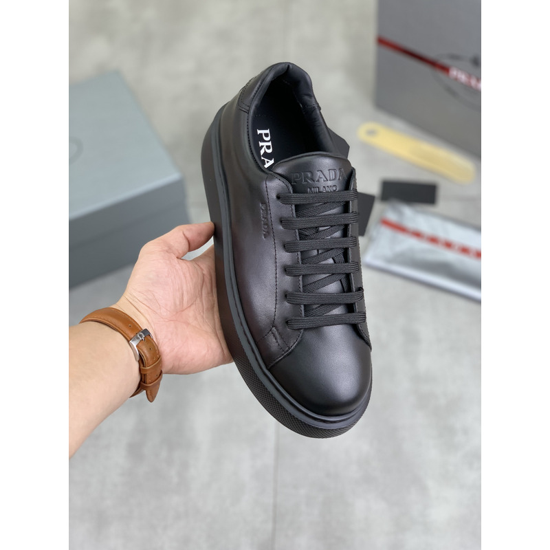 Pra*a logo leather sneaker in black