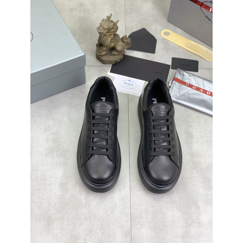 Pra*a logo leather sneaker in black