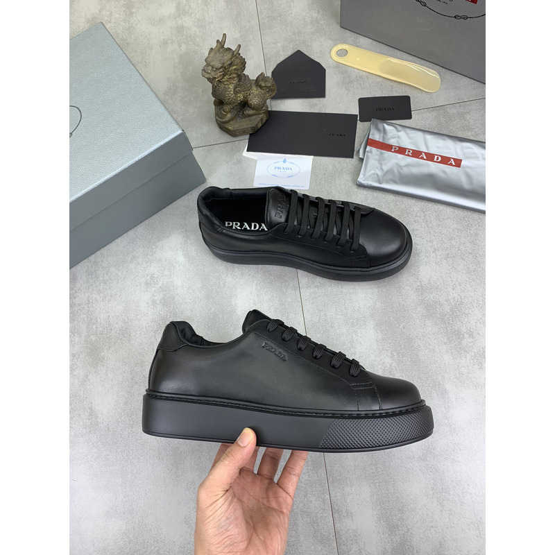 Pra*a logo leather sneaker in black