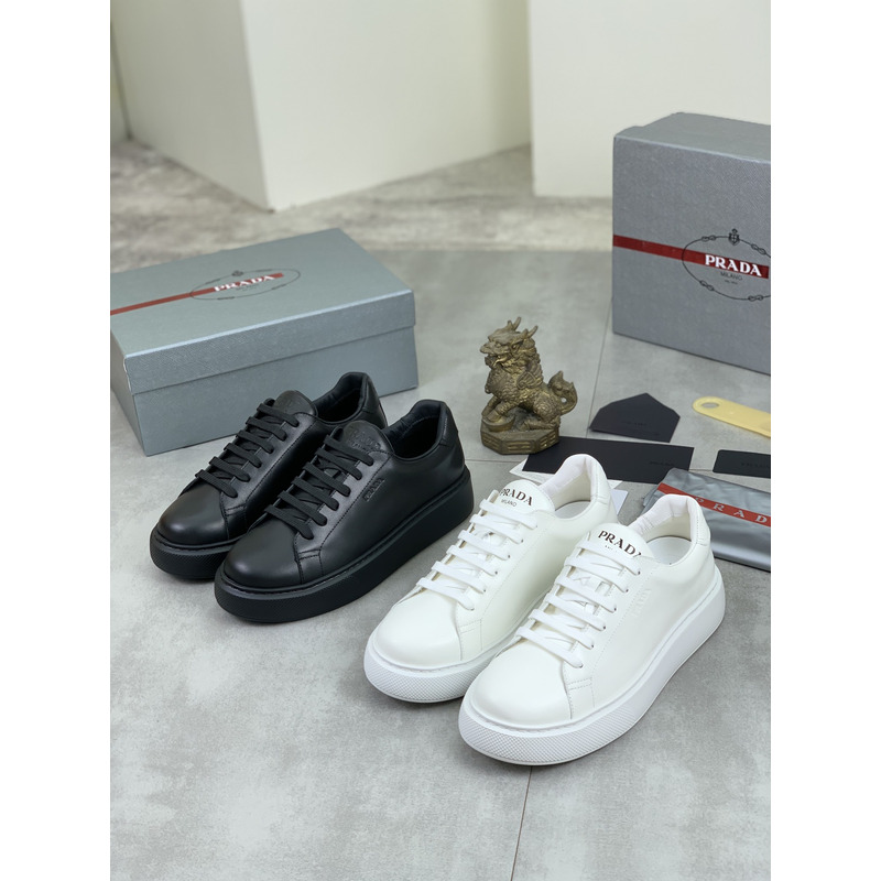 Pra*a logo leather sneaker in black