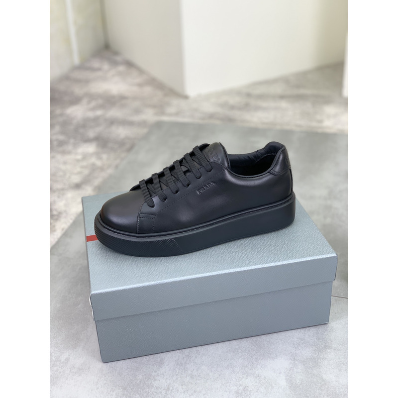 Pra*a logo leather sneaker in black