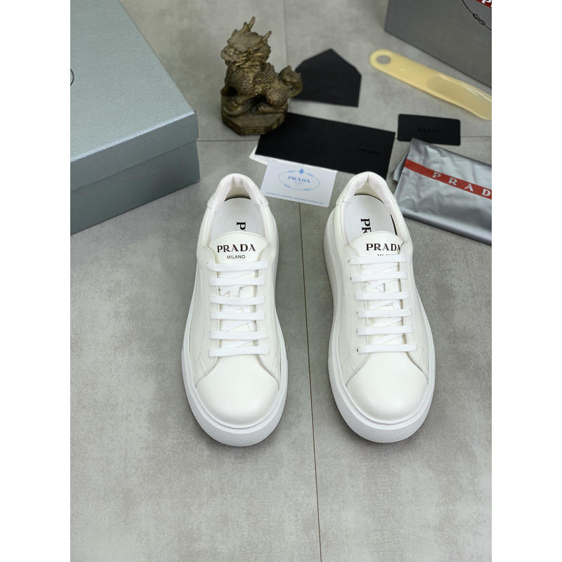 Pra*a logo leather sneaker in white