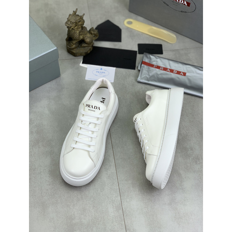 Pra*a logo leather sneaker in white