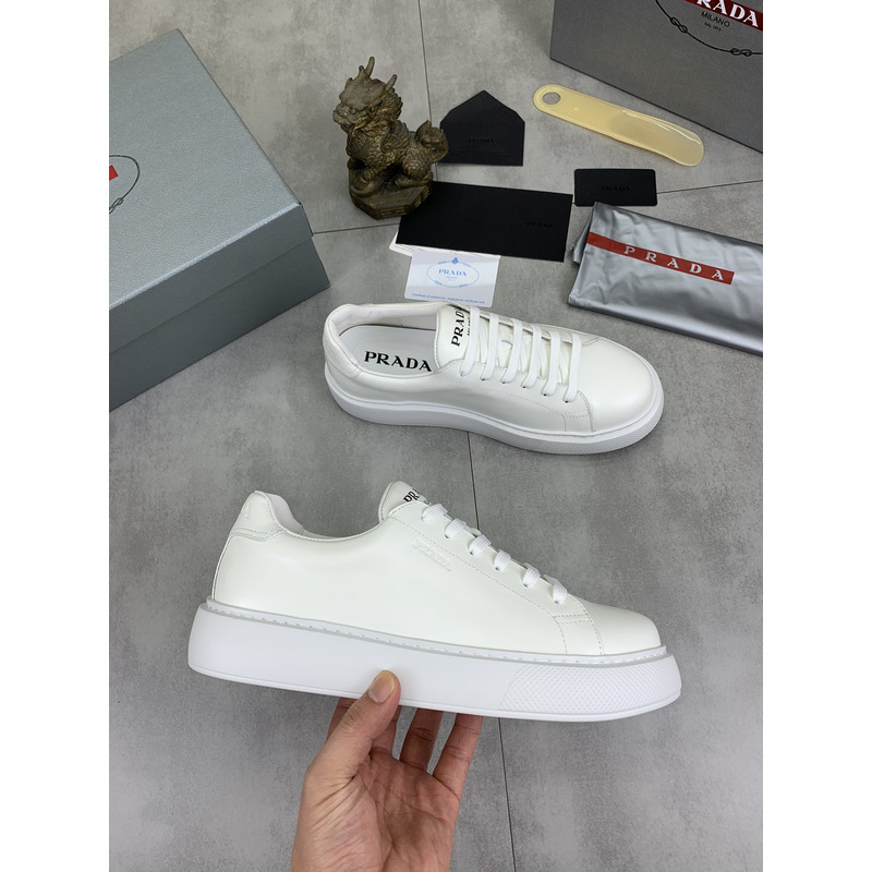 Pra*a logo leather sneaker in white