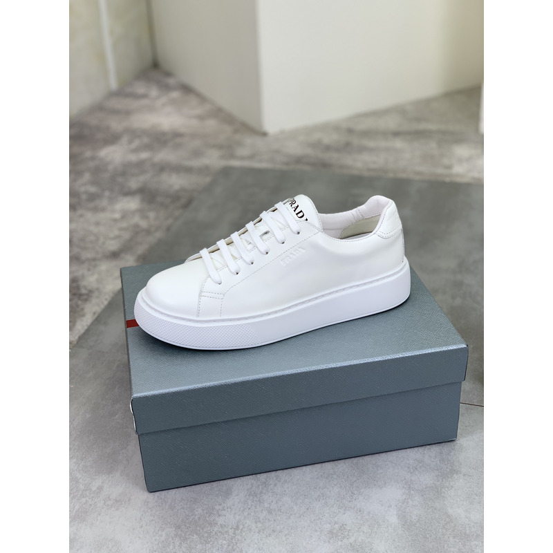 Pra*a logo leather sneaker in white