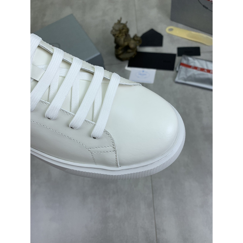 Pra*a logo leather sneaker in white