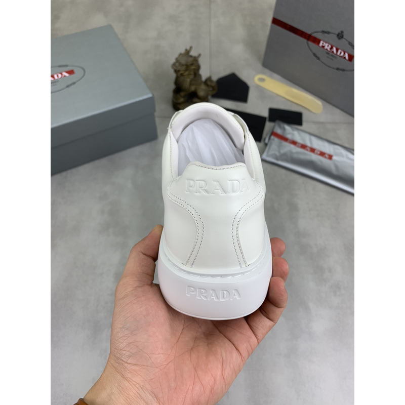 Pra*a logo leather sneaker in white