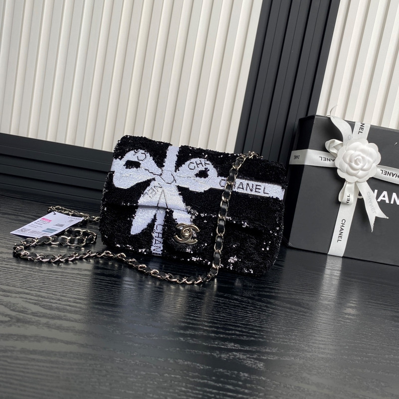 Ch*el bowknot flap bag sequins & silver-tone metal black & white