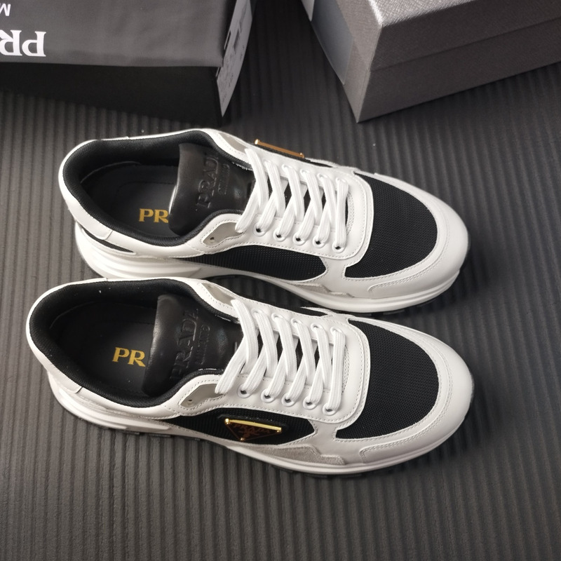 Pra*a suede and leather sneaker white black