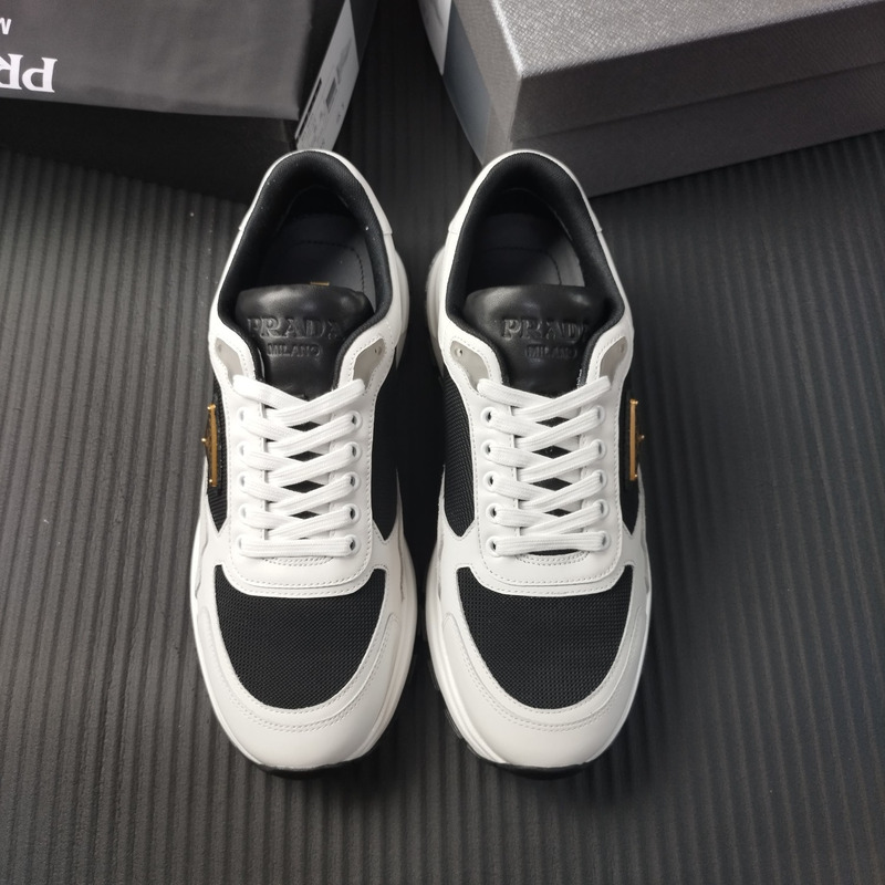 Pra*a suede and leather sneaker white black