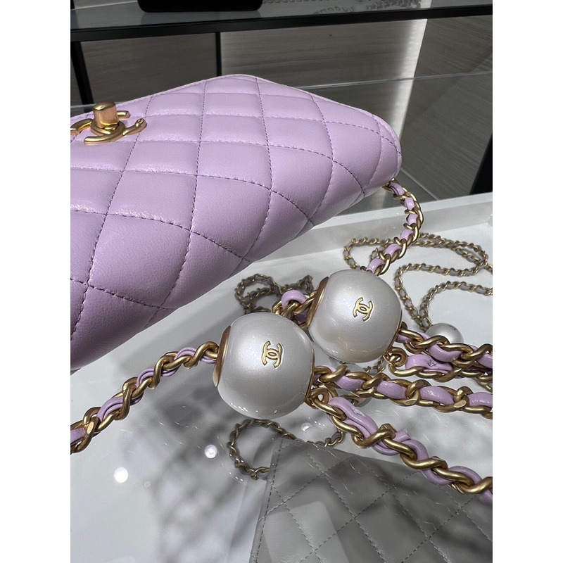 Ch*el lambskin, imitation pearls & gold metal in purple