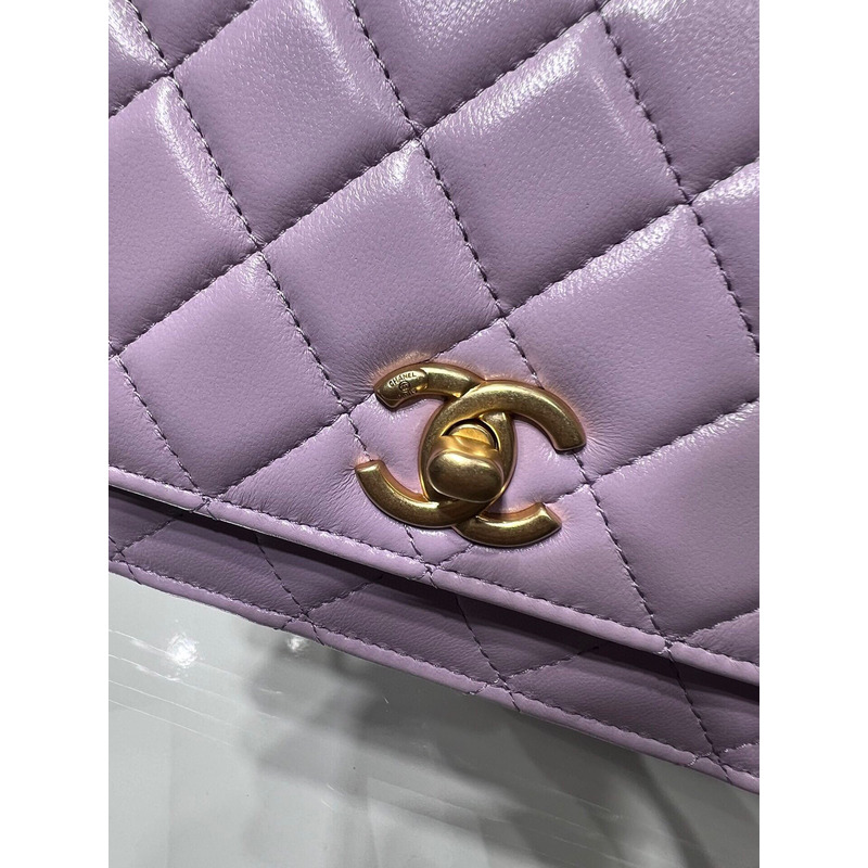 Ch*el lambskin, imitation pearls & gold metal in purple