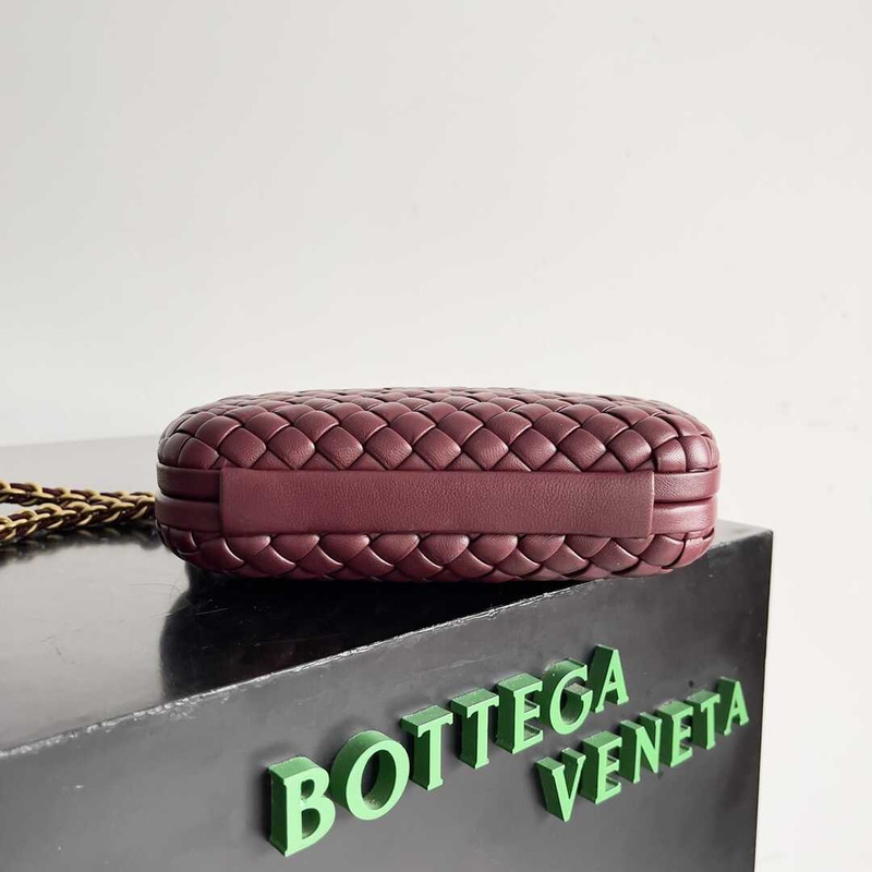 Bo*te*ga ve*ne*ta knot minaudiere clutch with chain in intreccio calfskin burgundy