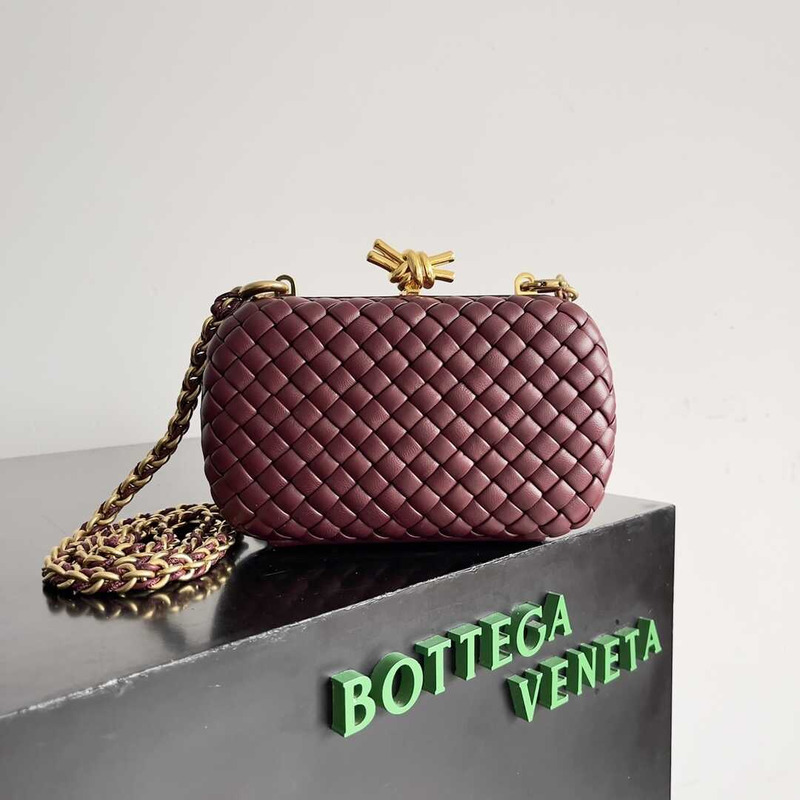 Bo*te*ga ve*ne*ta knot minaudiere clutch with chain in intreccio calfskin burgundy