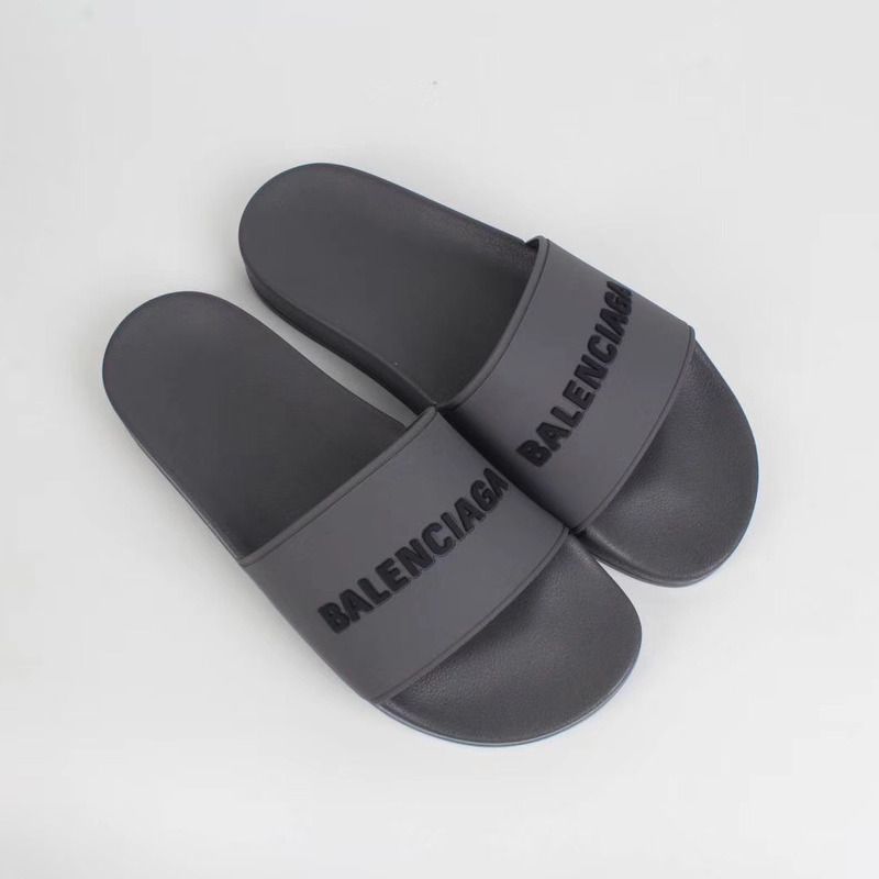 Ba*len*cia*ga black logo slides in gray