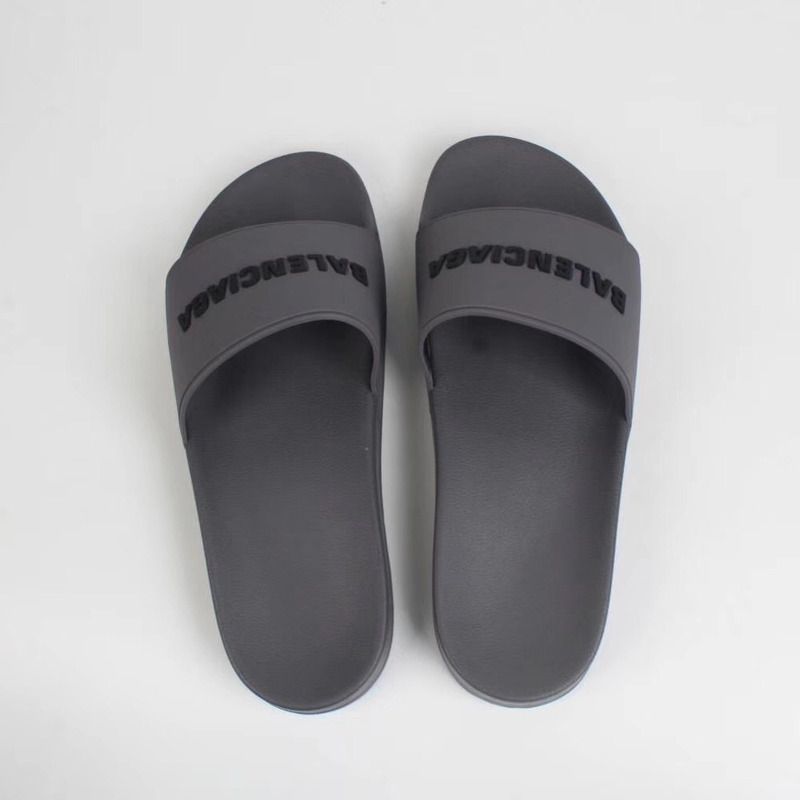 Ba*len*cia*ga black logo slides in gray