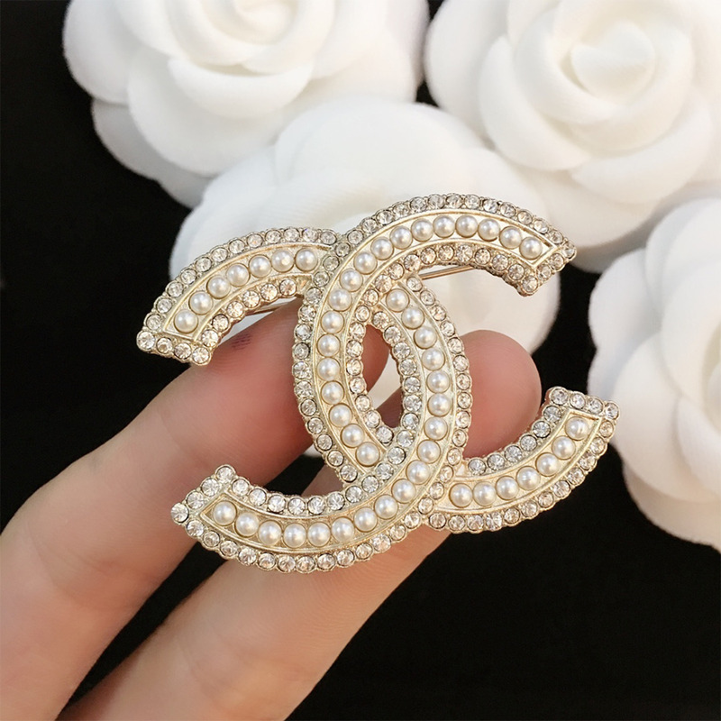 Ch*el  brooch