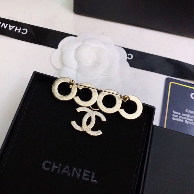 Ch*el coco brooch