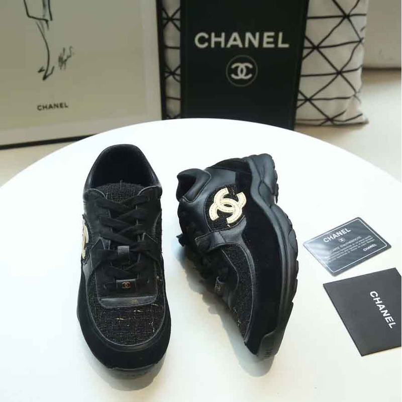 Ch*el suede calfskin sneakers in black & gold logo