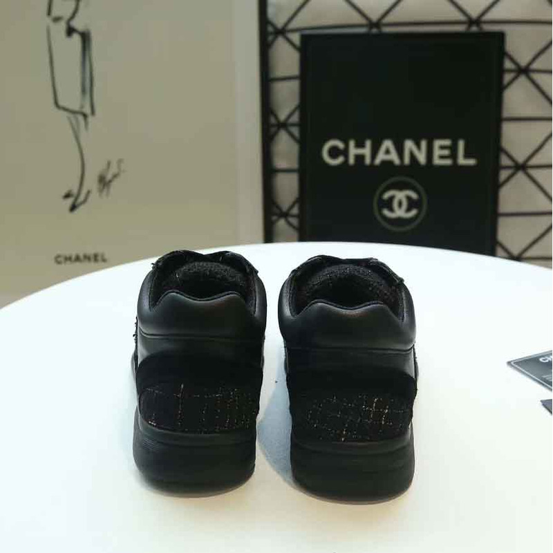 Ch*el suede calfskin sneakers in black & gold logo