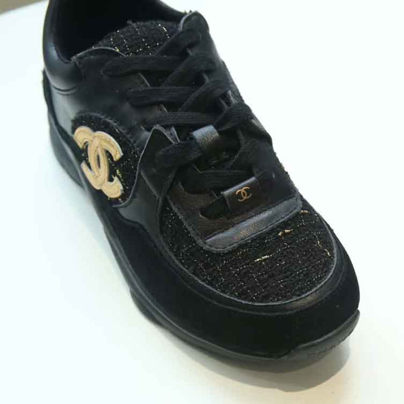 Ch*el suede calfskin sneakers in black & gold logo