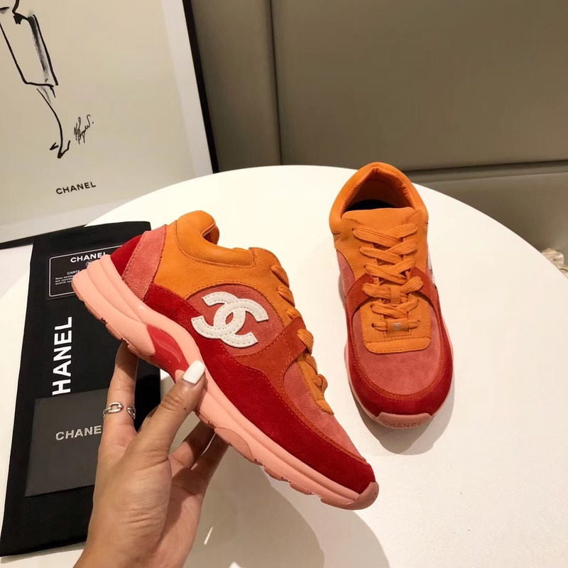 Ch*el suede calfskin sneakers in orange/red